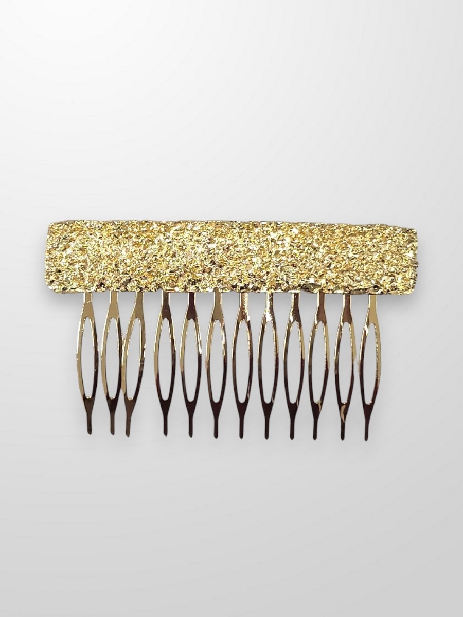 Peinecillo dorado repujado