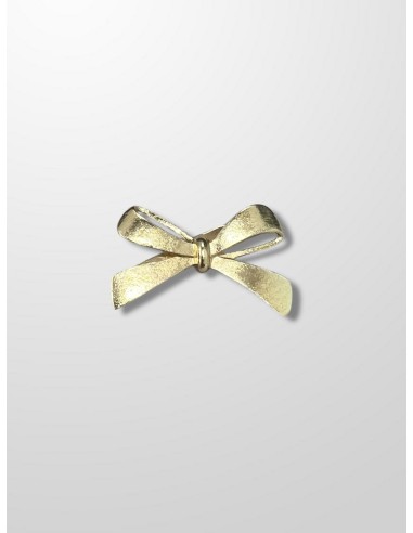 Broche dorado con forma de lazo