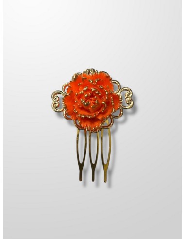 Peinecillo dorado y flor