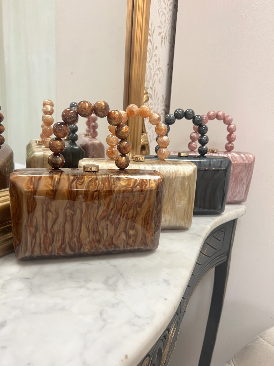 Clutch nacar con asa