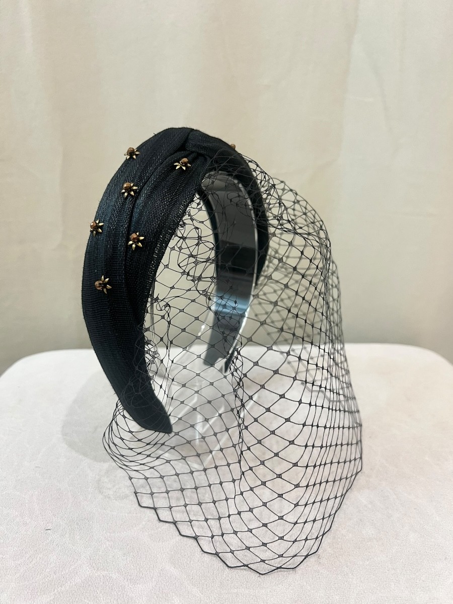 Alquilar diadema negra con mini estrellas