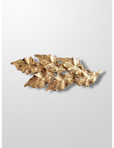 Broche dorado helecho