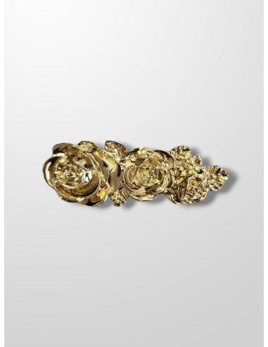 Broche dorado rosas